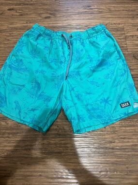 Saxx Teal Tropical Print Men's Swim Trunks
Size: L
7”